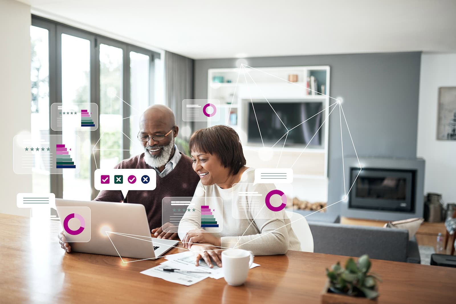 Cropped shot of a happy senior couple using a laptop in their living room to look at their financial budgets