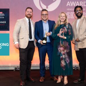 Open Banking Expo co-founders Adam Cox and Kelly Stanley on stage at The EN Indy Awards for Best 365 Community